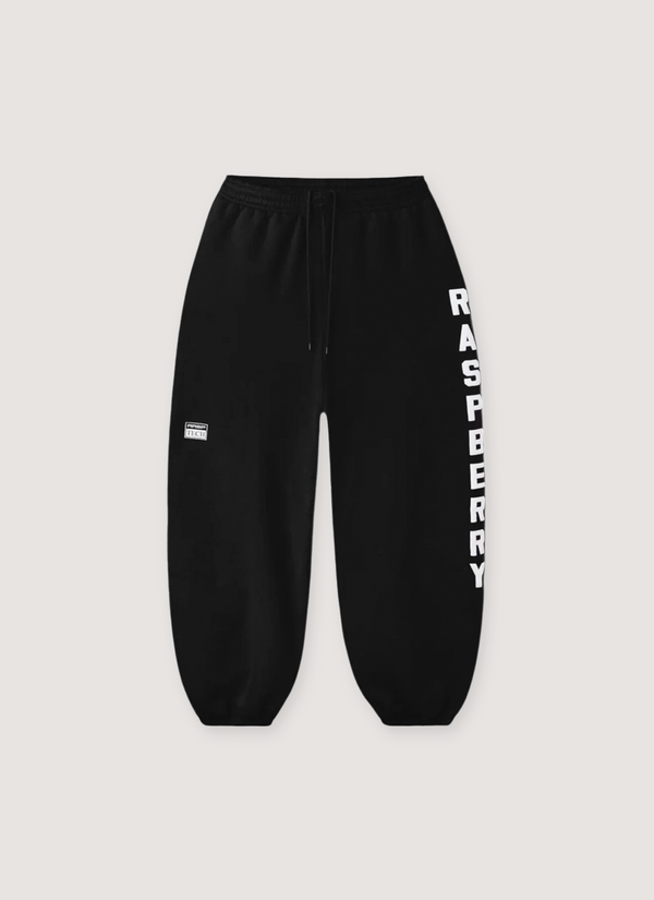 GV Gallery Weekday Sweatpants Black with "RASPBERRY" print going down the leg, front view Weekday Sweatpants Black - Authenticated Sweatpants | Pieces Los Angeles