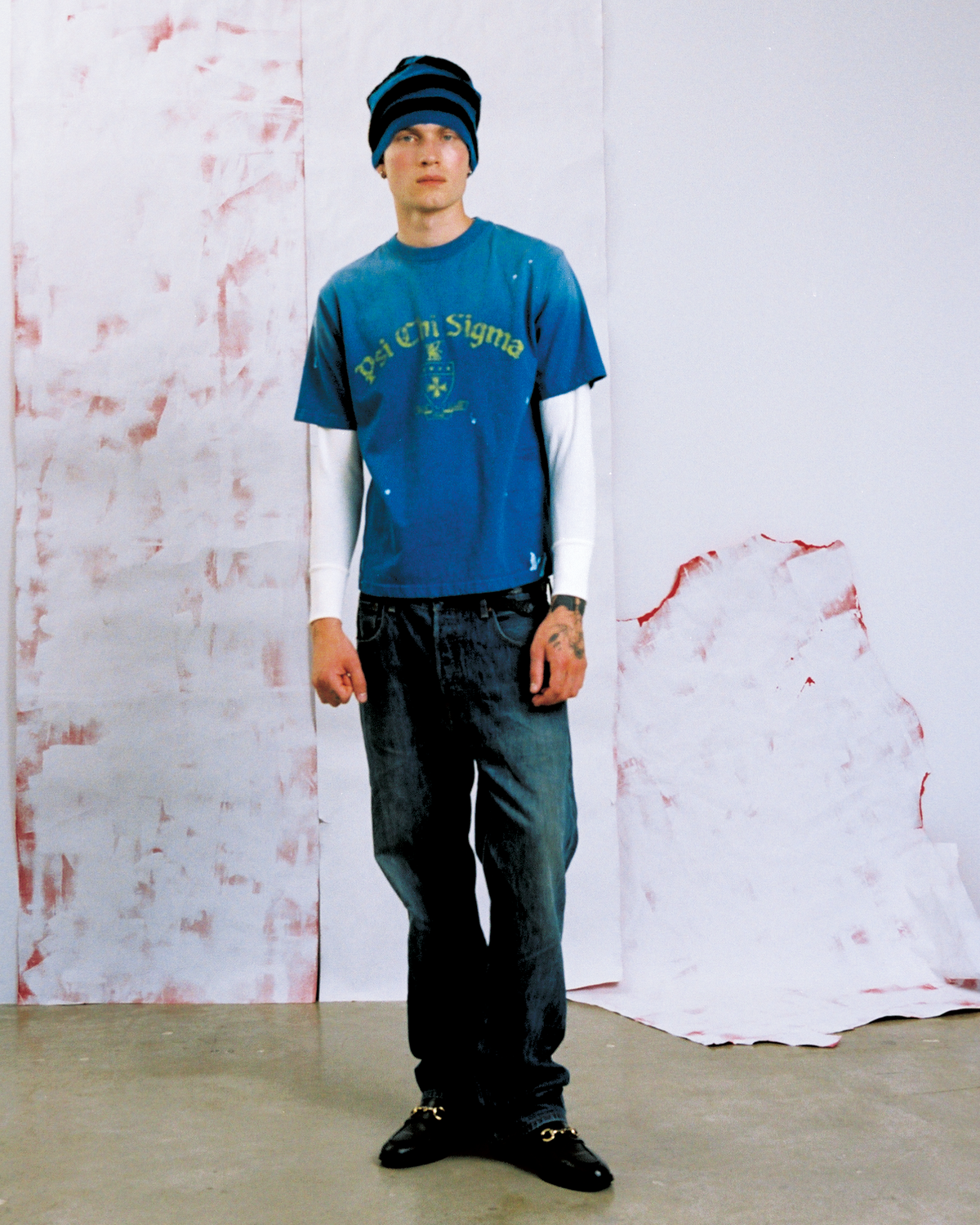 Model wearing New Age graphic tee and beanie — Pieces Los Angeles