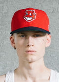 Man wearing Pieces God vs Devil Baseball Cap Hat Red Navy with Devil logo, close up front view Pieces God vs Devil Baseball Cap Red Navy - Image 5 | Authenticated at Pieces Los Angeles