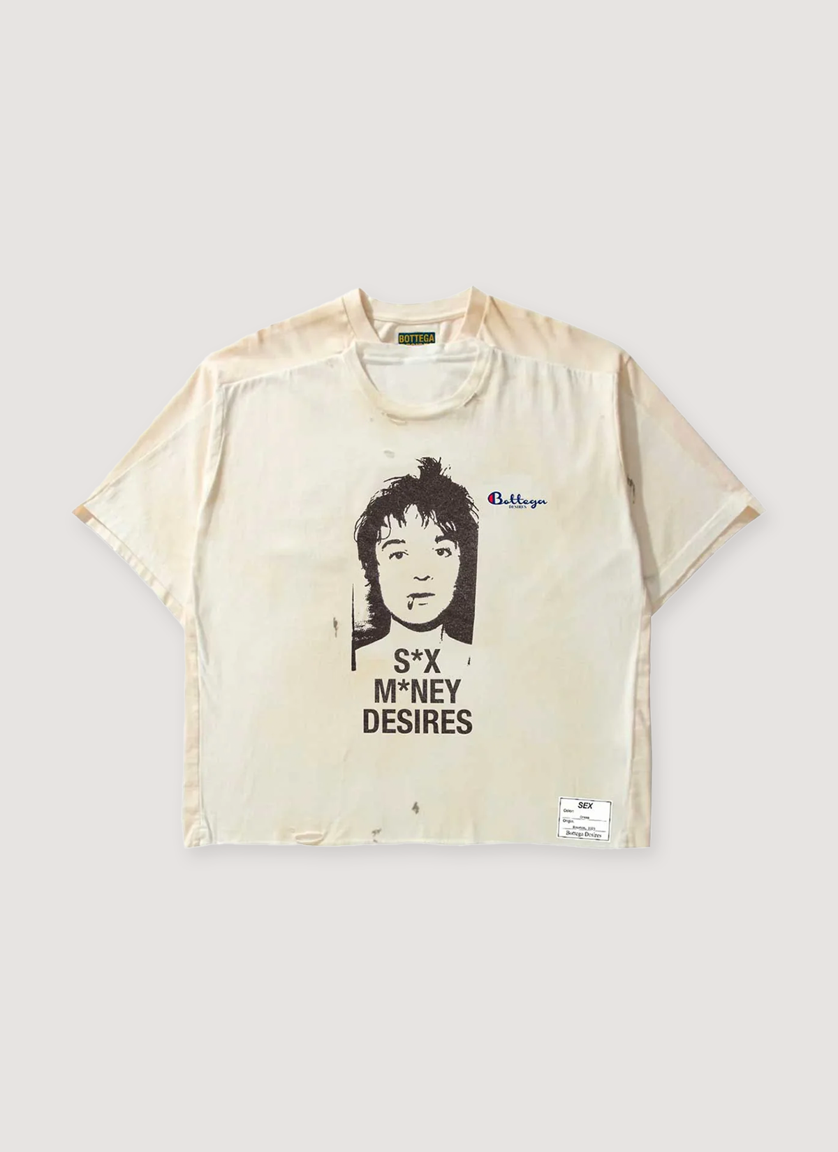 Bottega Desires Sex Sells Tee Shirt Vintage White garmen wash and dye, double front tee design, printed black graphic of girl and text that says Sex Money Desires, embroisered logos, distressed details, front view Bottega Desires Sex Sells Tee Vintage White - Image 1 | Authenticated at Pieces Los Angeles