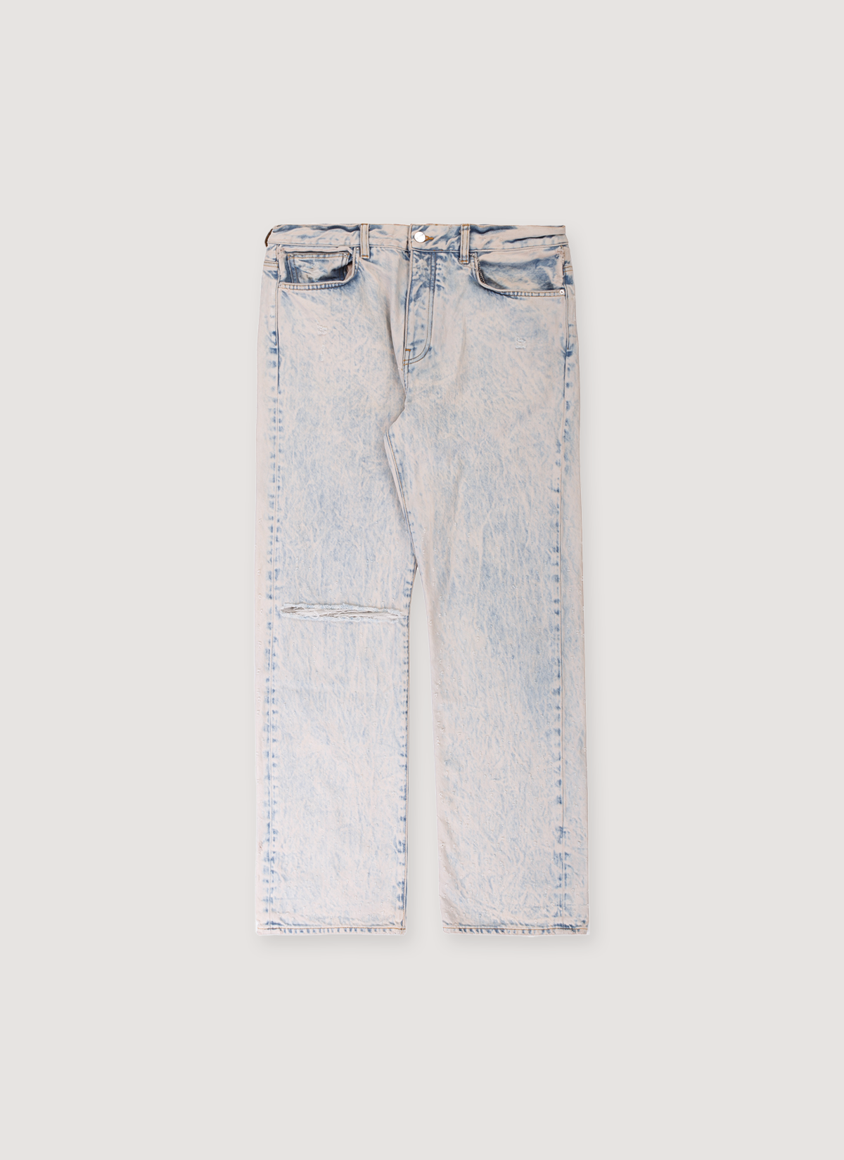 Amiri Shotgun Jeans Acid Wash Cream Tan Blue Denim with ripped knee front view