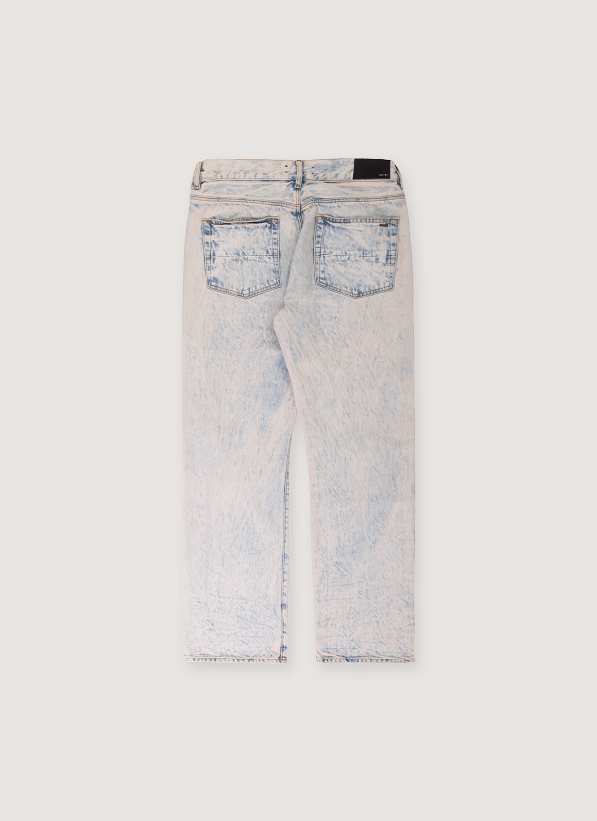 Amiri Shotgun Jeans Acid Wash Cream Tan Blue Denim back view with two back pockets