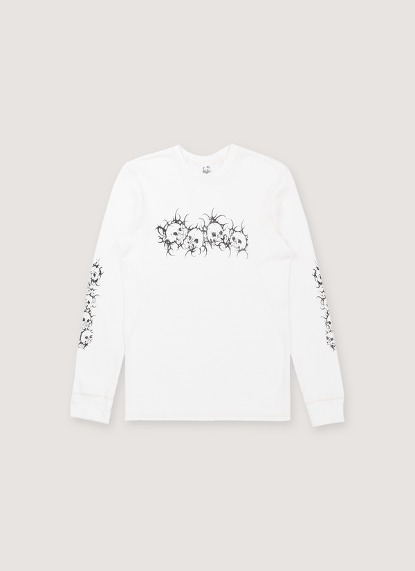 Basketcase Gallery Afflicted Thermal Bone white longsleeve shirt front view with skull design on the shirt and sleeves Afflicted Thermal Bone - Authenticated Longsleeves | Pieces Los Angeles