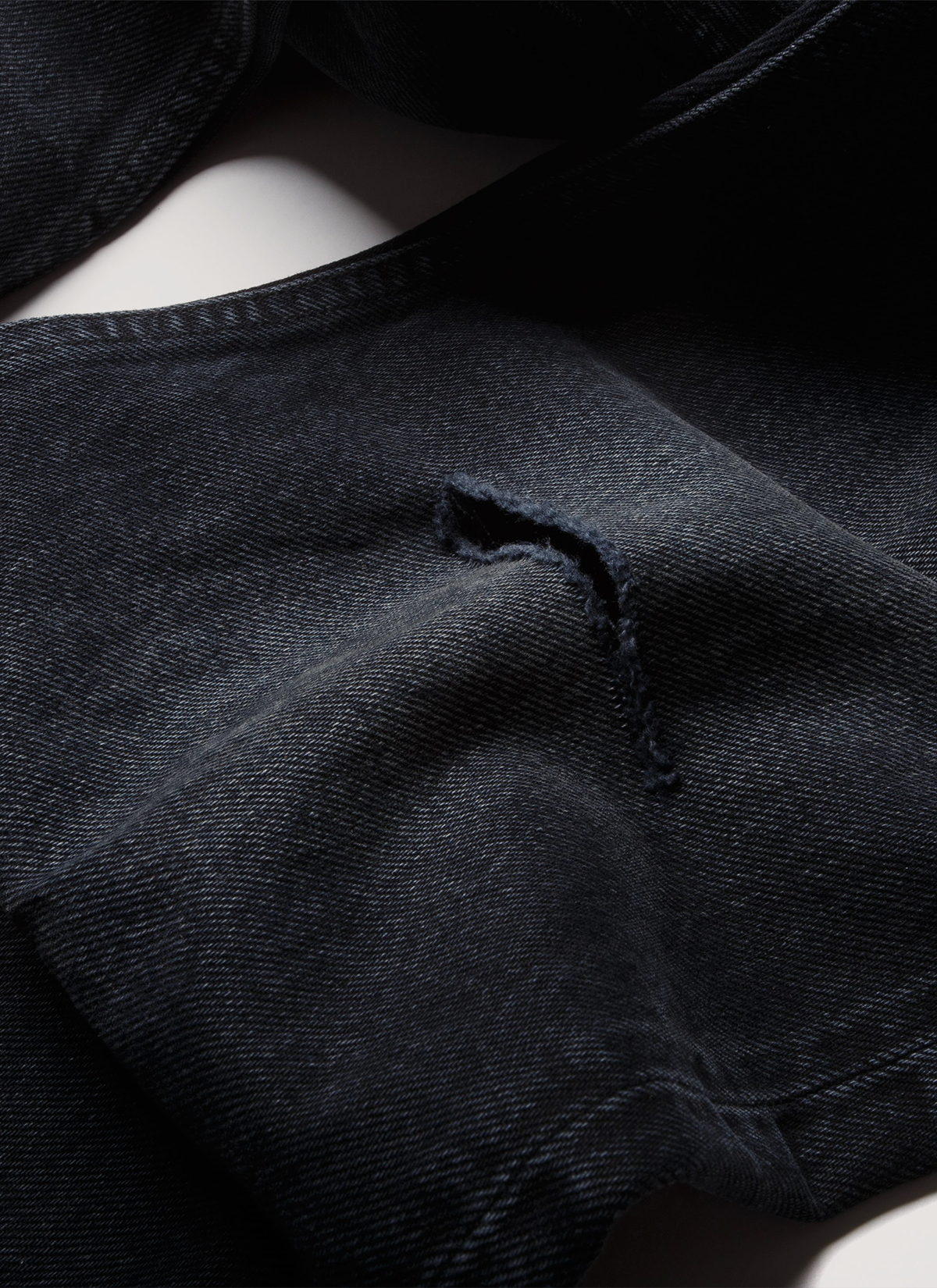 Pieces Alexander Denim Washed Black jeans close up shot of the distressing details