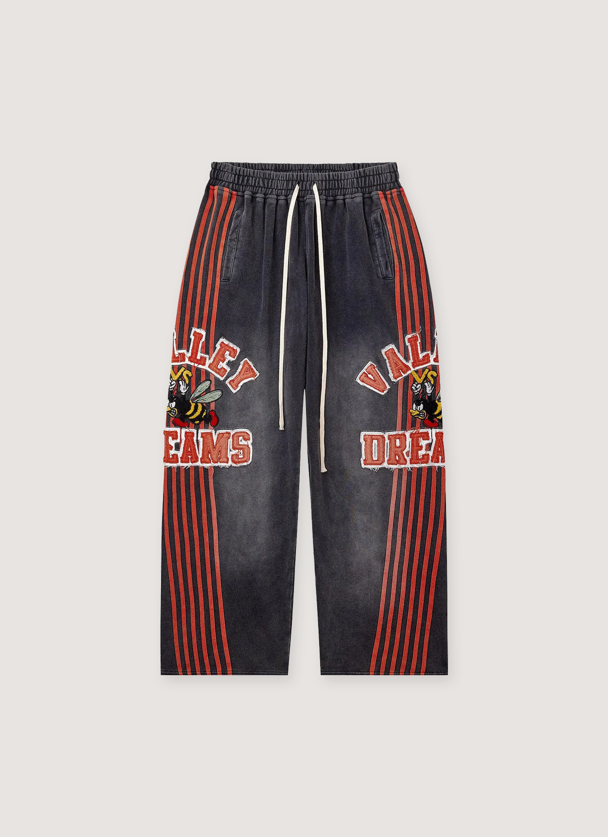 Vale Forever Anthem Tracks Sweatpants Black Red washed look with red lines running down the side and a cartoon bee logo on both legs, front view