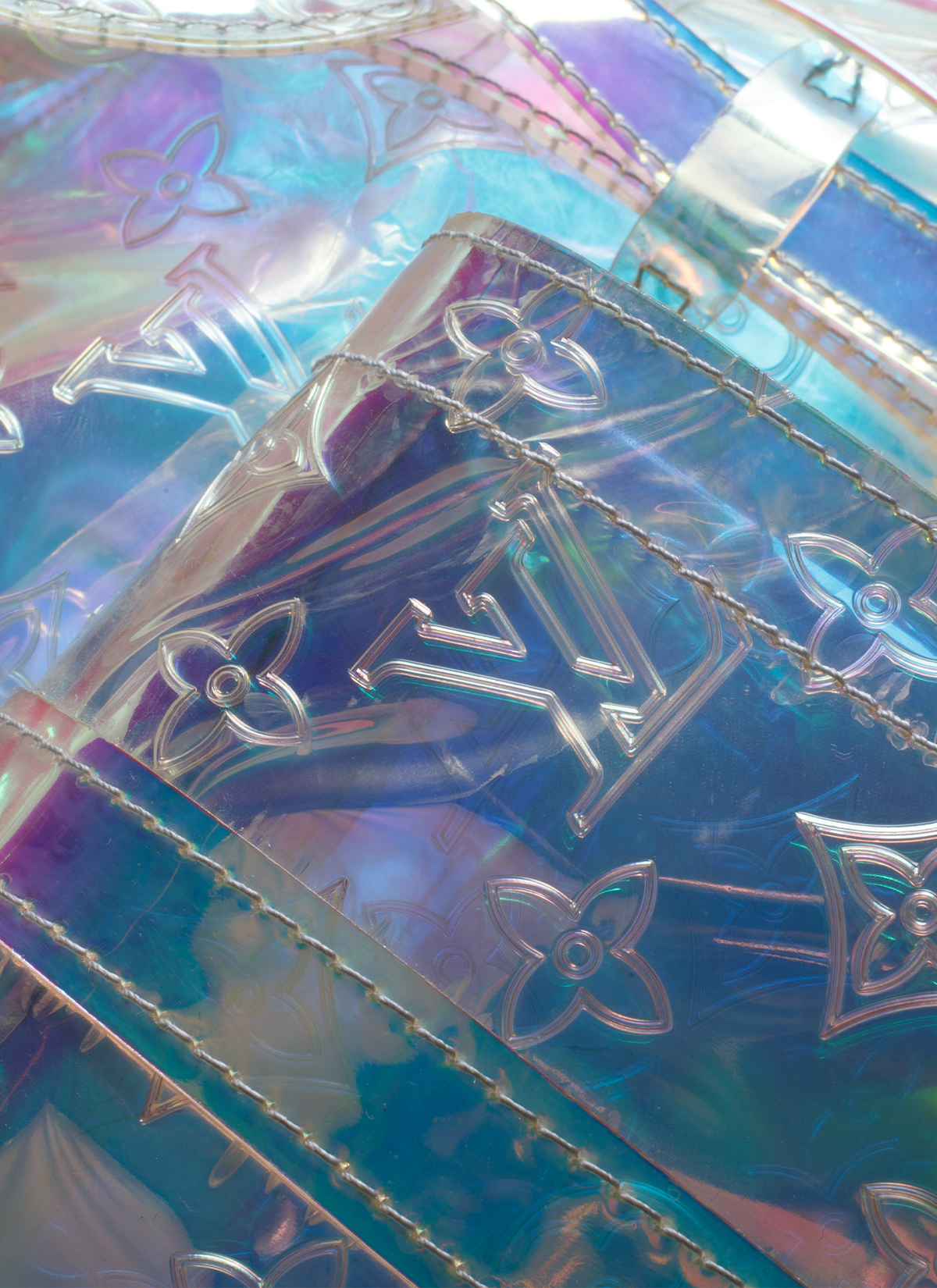 Louis Vuitton Christopher Backpack GM Monogram Prism pre-owned close up of VL logo with flowers