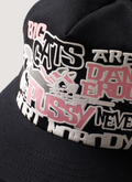 Pieces Big Cat Trucker Hat Black Pink that says Big Cats Are Dangerous But A Little Pussy Never Hurt Nobody!, close up of the graphic text Pieces Big Cat Trucker Hat Black Pink - Image 3 | Authenticated at Pieces Los Angeles