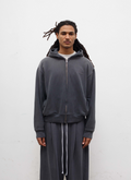 Man wearing the Pieces Basic Program Zip Up Sweatshirt Washed Black grey hoodie with zipper, front view Pieces Basic Program Zip Up Sweatshirt Washed Black - Image 3 | Authenticated at Pieces Los Angeles