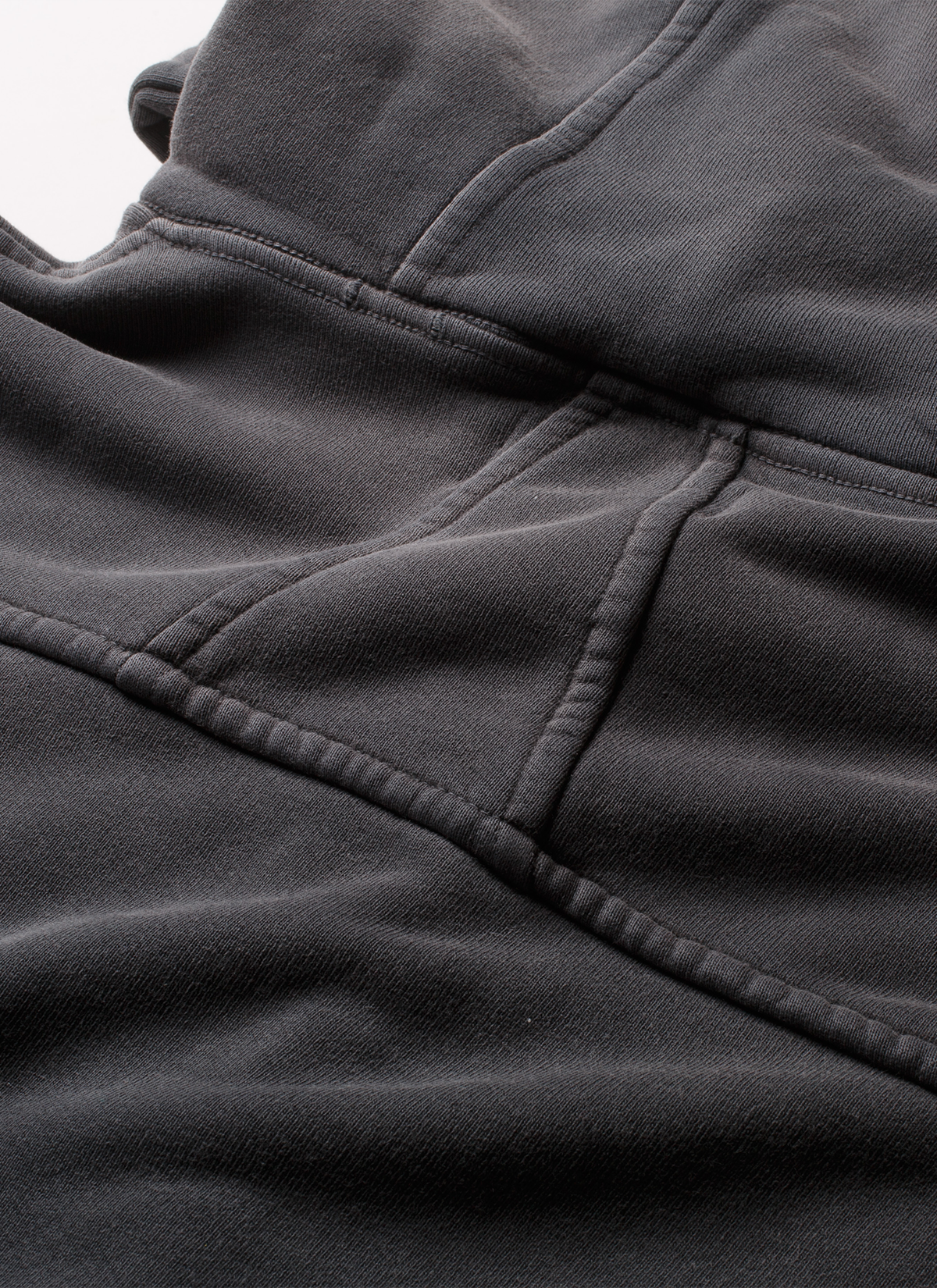 Close up of the stitching on the back side of the Pieces Basic Program Zip Up Sweatshirt Washed Black Pieces Basic Program Zip Up Sweatshirt Washed Black - Image 7 | Authenticated at Pieces Los Angeles