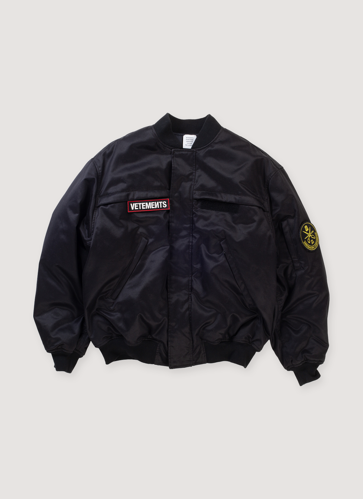 Vetements Police Bomber Black (Pre-Owned) Jacket with cotton and nylon, velcro attachable embroidered patch details, snap and zip front closure, zippered outer pockets, snap inner pockets, oversized, front view