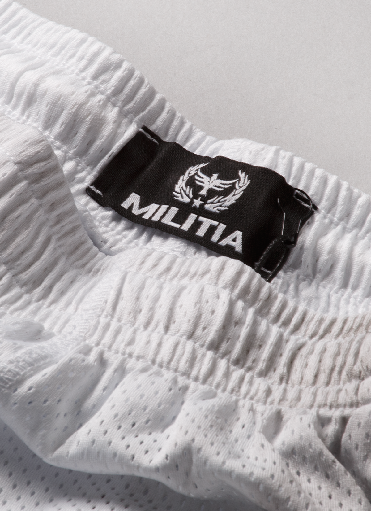 Awaited Militia Club Mesh 3/4 Shorts White Awaited Militia Club Mesh 3/4 Shorts White - Image 4 | Authenticated at Pieces Los Angeles