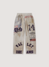 Vale Forever Crash Sweatpants Dirty Grey with faded graphics aand patches all over, front view