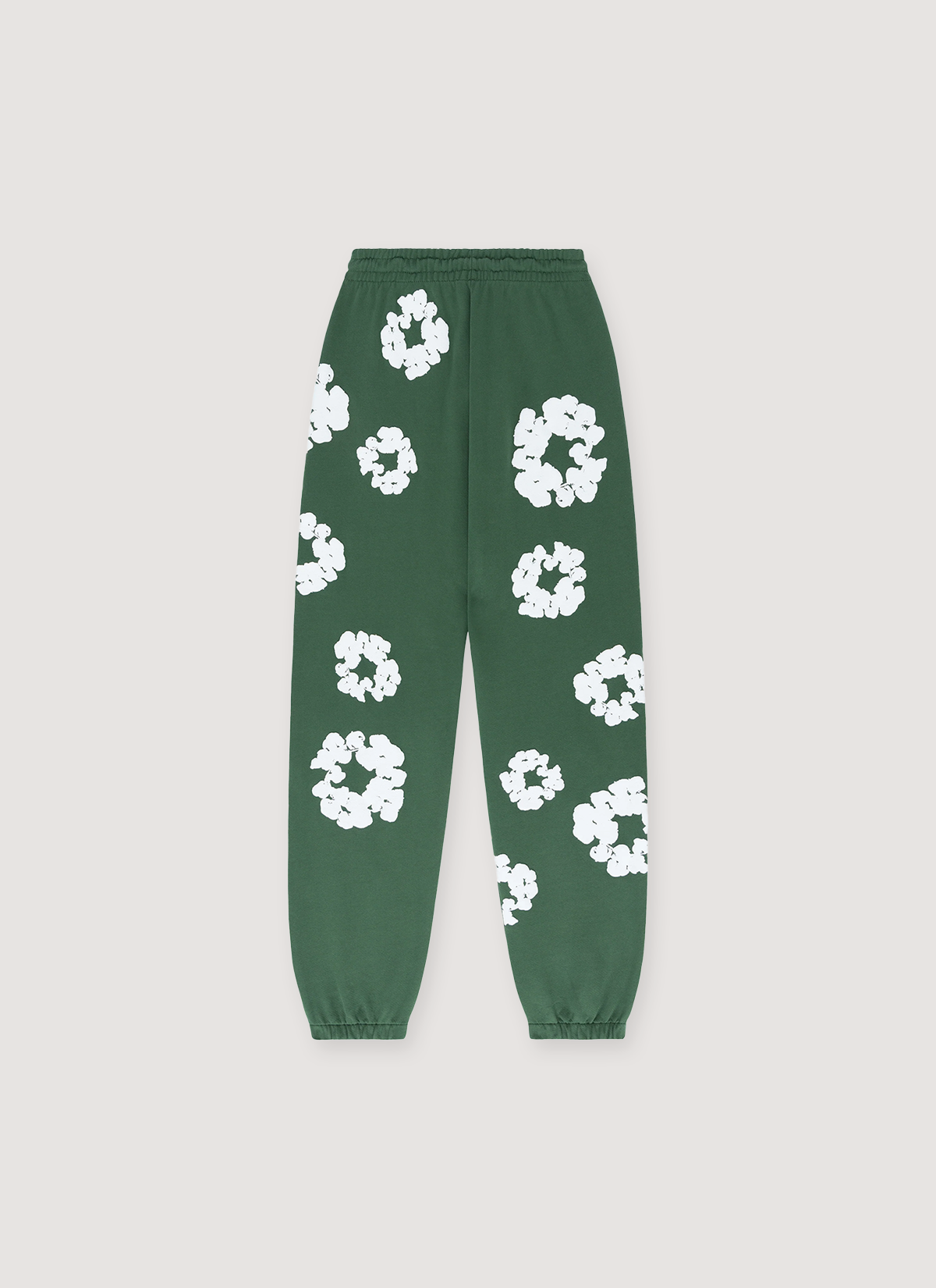 Denim Tears Cotton Wreath Sweatpants Green cuffed with white floral wreaths front view Denim Tears Cotton Wreath Sweatpants Green - Image 1 | Authenticated at Pieces Los Angeles