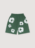 Denim Tears Cotton Wreath Sweatshorts Green with white wreath flowers all over, front view Denim Tears Cotton Wreath Sweatshorts Green - Image 1 | Authenticated at Pieces Los Angeles