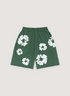 Denim Tears Cotton Wreath Sweatshorts Green with white wreath flowers all over, front view
