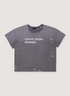 Enfants Riches Déprimés Classic Logo Tee Shirt Damaged Black with rib knit neckline, printed white text logo, distressed details, paint splatters, signature wash process, single stitch hems, front view