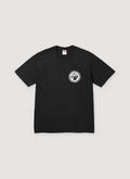 Supreme Devotion black tee shirt with small white logo front view Supreme Devotion Tee - Image 3 | Authenticated at Pieces Los Angeles