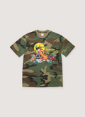 Supreme All Dogs Go To Heaven Tee shirt camo colorway with dog graphic design front view Supreme All Dogs Go To Heaven Tee - Image 3 | Authenticated at Pieces Los Angeles