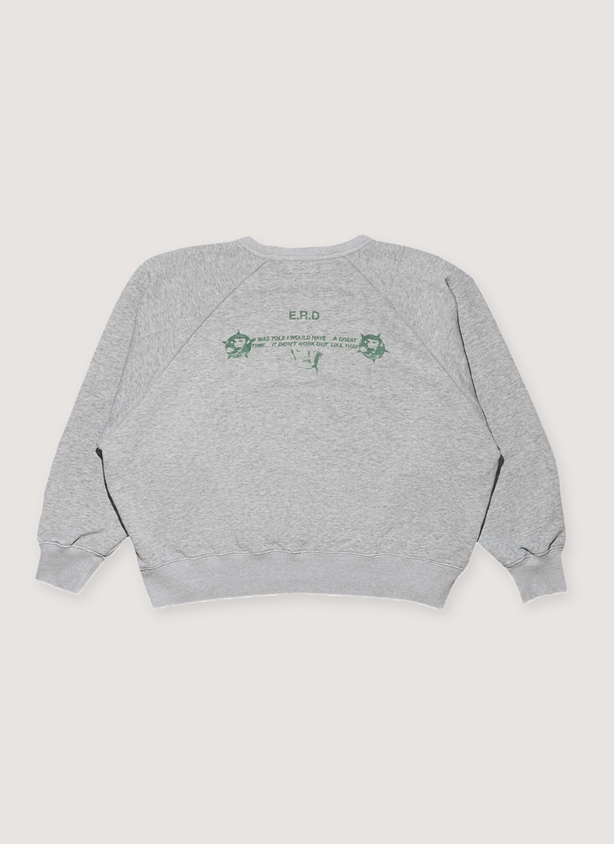 Enfants Riches Déprimés The Dream That Won't Go Away Raglan Sweatshirt Crewneck Heather Grey cotton fleece with ribbed cuff, ribbed neck, ribbed hem, with green vintage graphic and text, back view Enfants Riches Déprimés The Dream That Won't Go Away Raglan Sweatshirt Heather Grey - Image 2 | Authenticated at Pieces Los Angeles