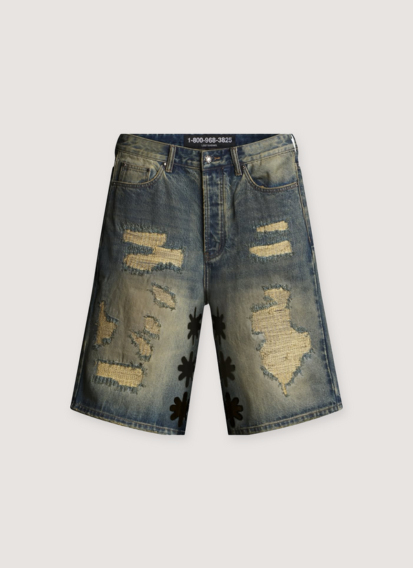 Lost SHDWS DSTRY Denim Shorts Blue Black with repaired holes all over and asterisks running down the inseam, front view DSTRY Denim Short Blue Black - Authenticated Shorts | Pieces Los Angeles