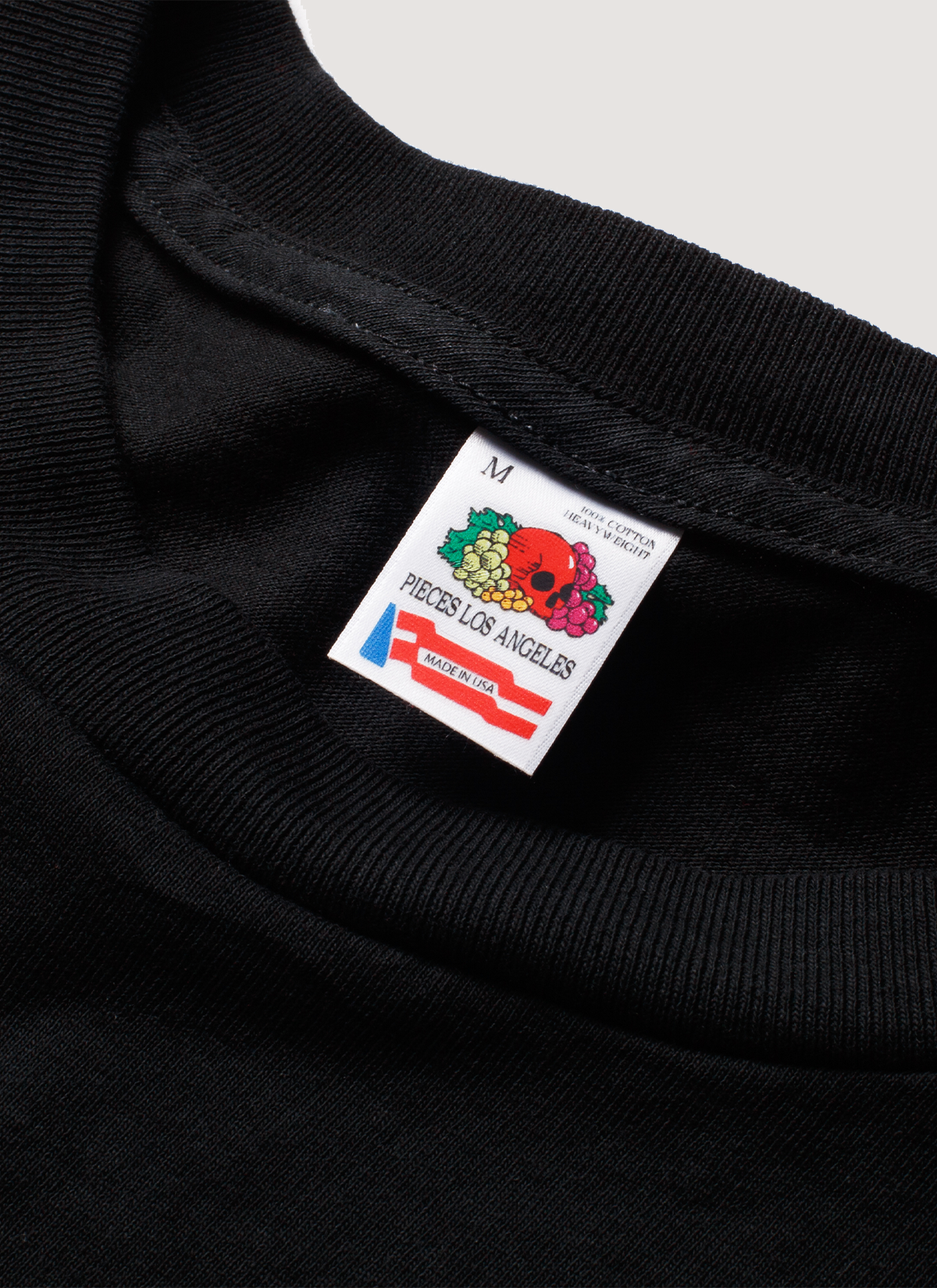 Pieces Fast Bikes Pocket Tee Shirt Vintage Black close up view of tag