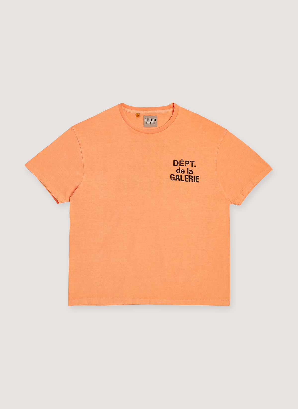 Gallery Dept. French Logo Tee Shirt Flo Orange with printed black logo text that says Dept de la Galerie, vintage wash and dye methods, boxy, flowy fit, front view