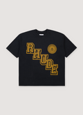 Rhude Collegiate Crest Tee Shirt Vintage Black with printed yellow graphic text, rib knit crewneck, dropped shoulders, front view Rhude Collegiate Crest Tee Vintage Black - Image 1 | Authenticated at Pieces Los Angeles