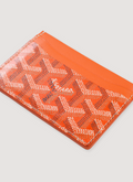 Goyard Saint-Sulpice Card Wallet Orange pattern design (Pre-Owned) 4 card slots, 1 central slot, angled view Goyard Saint-Sulpice Card Wallet Orange (Pre-Owned) - Image 3 | Authenticated at Pieces Los Angeles
