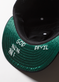 Pieces God Vs Devil Baseball Cap hat Navy Blue with green underbrim with white text, bottom view Pieces God Vs Devil Baseball Cap Navy - Image 5 | Authenticated at Pieces Los Angeles