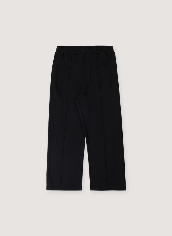 Helmut Lang Embossed Studio Joggers Black with embossed logo at front waist, elasticated waist with adjustable drawstrings, pintucked creased front, slip and back patch pockets, straight leg cut, front view Embossed Studio Joggers Black - Authenticated Sweatpants | Pieces Los Angeles