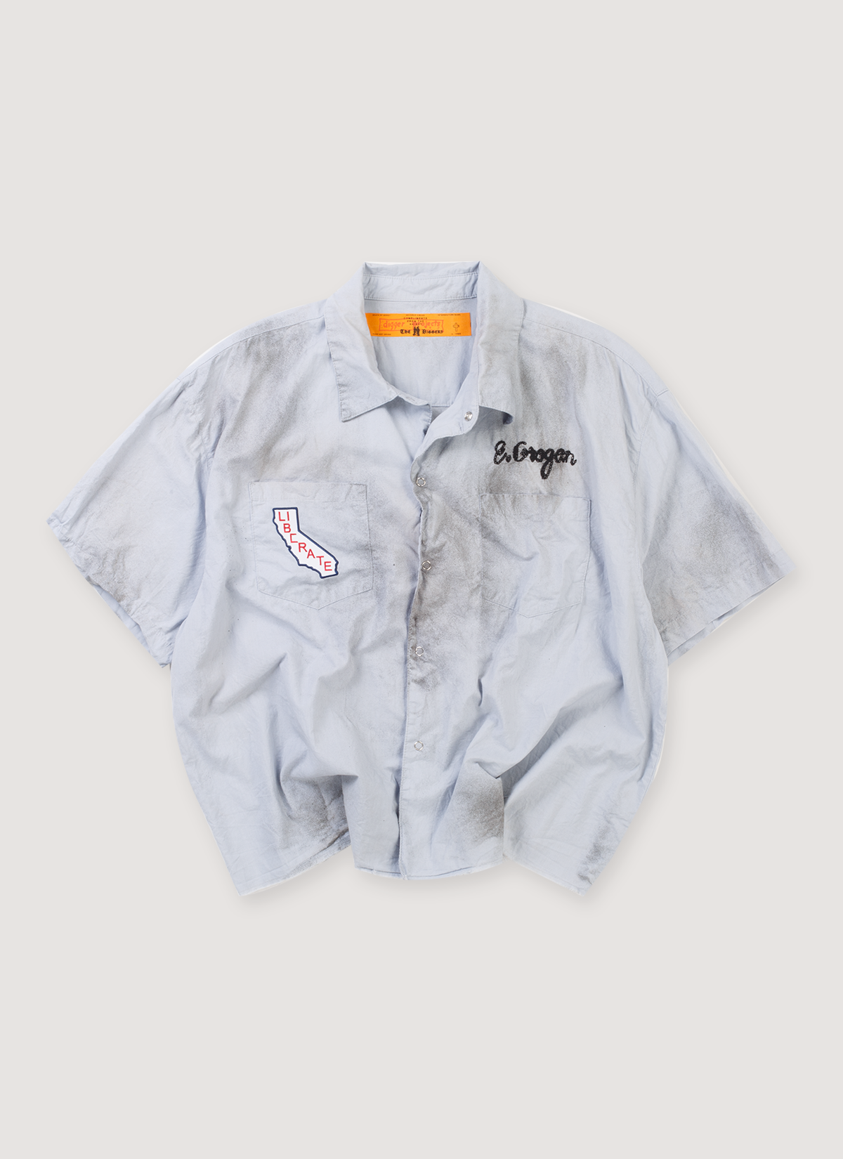 Paly Hollywood House of Richard Mechanic Shirt Baby Blue (Pre-Owned) garment dye utility work shirt with collar, single needle embroidery, chain stitched art, hand stained,distressed, raw edge hem, small logo patches, front view Paly Hollywood House of Richard Mechanic Shirt Baby Blue (Pre-Owned) - Image 1 | Authenticated at Pieces Los Angeles