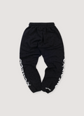Chrome Hearts Cemetery Cross Horseshoe Sweatpants Black (Pre-Owned) withwhite graphic text on the legs, back view Chrome Hearts Cemetery Cross Horseshoe Sweatpants Black (Pre-Owned) - Image 2 | Authenticated at Pieces Los Angeles