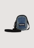 Supreme Denim Mini Utility Bag Washe with water resistant Cordura nylon, embossed logo lining, additional zip, interior pocket, adjustable shoulder strap, embossed 3M logo, woven logo Supreme Denim Mini Utility Bag - Image 2 | Authenticated at Pieces Los Angeles