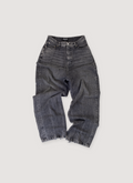 Balenciaga Japanese Pull Up Denim Extra Large Pants Black (Pre-Owned) baggy fit, Japanese cotton twill, distressed bottom hems, 5 pocket design, button and zipper fly, front view Balenciaga Japanese Pull Up Denim Extra Large Pants Black (Pre-Owned) - Image 1 | Authenticated at Pieces Los Angeles