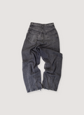 Balenciaga Japanese Pull Up Denim Extra Large Pants Black (Pre-Owned) baggy fit, Japanese cotton twill, distressed bottom hems, 5 pocket design, button and zipper fly, back view Balenciaga Japanese Pull Up Denim Extra Large Pants Black (Pre-Owned) - Image 2 | Authenticated at Pieces Los Angeles