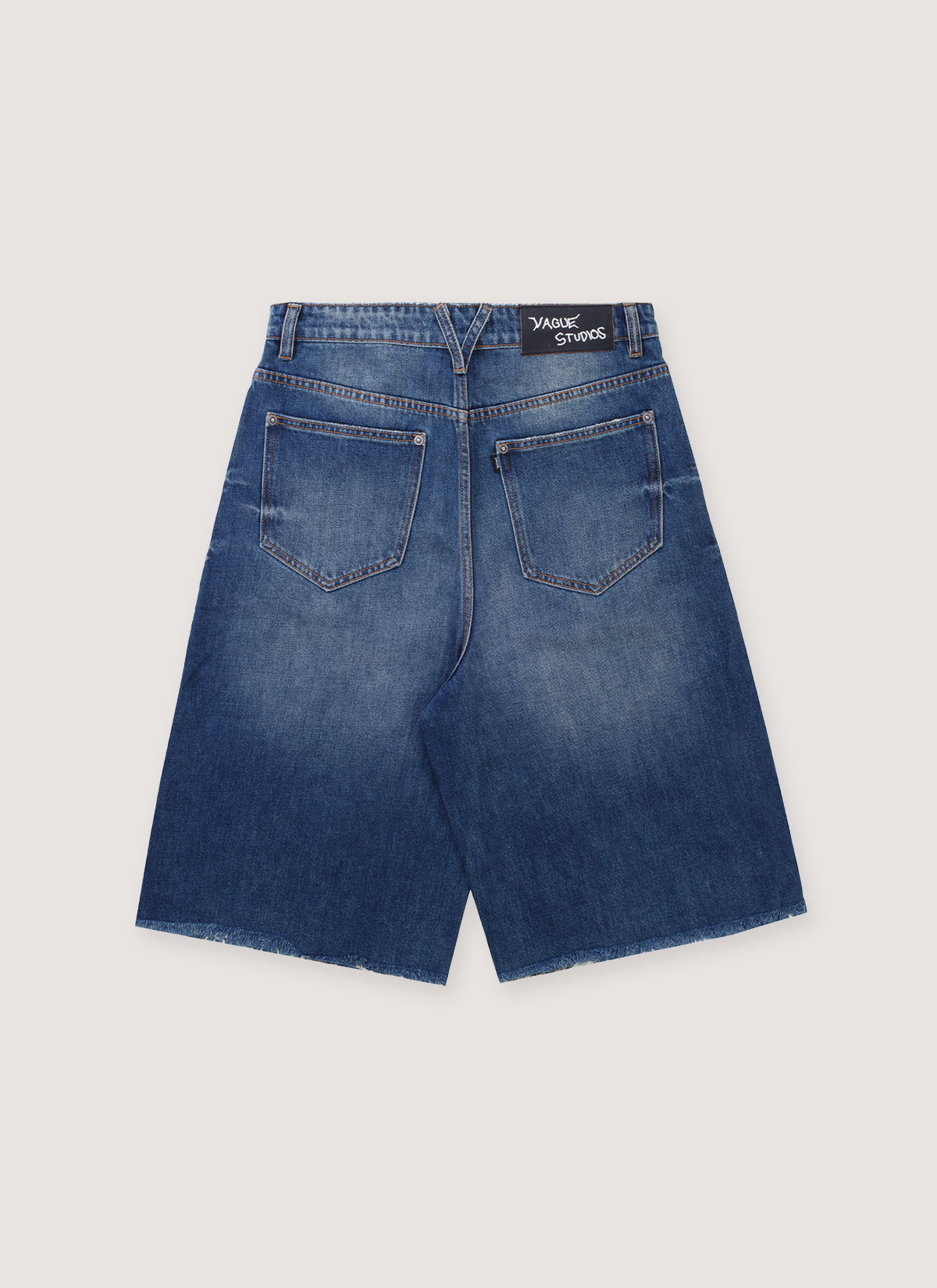 Vague Studios Studio Jorts Stones' Wash blue indigo distressed denim shorts, back view