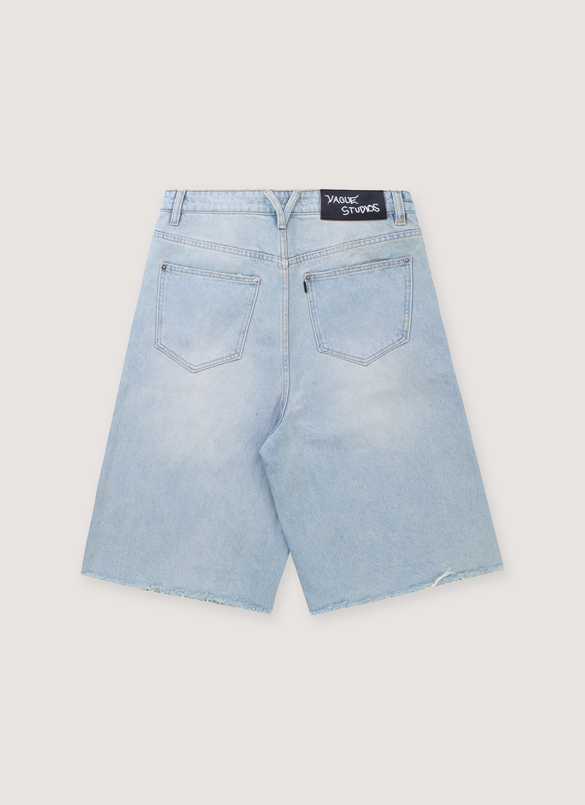 Vague Studios Jorts Coast Light Blue Denim Shorts with black patch on the waist, back view