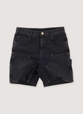 Louis Vuitton Monogram Double Knee Denim Shorts Washed Black (Pre-Owned) with calf leather back tab, embossed monogram details, double knee carpenter, hammer loop, front view Louis Vuitton Monogram Double Knee Denim Shorts Washed Black (Pre-Owned) - Image 1 | Authenticated at Pieces Los Angeles