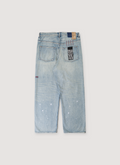 Ksubi Maxx Scatter Denim Blue jeans with light white pain splatter, faded wash, and patches, back view Ksubi Maxx Scatter Denim Blue - Image 2 | Authenticated at Pieces Los Angeles