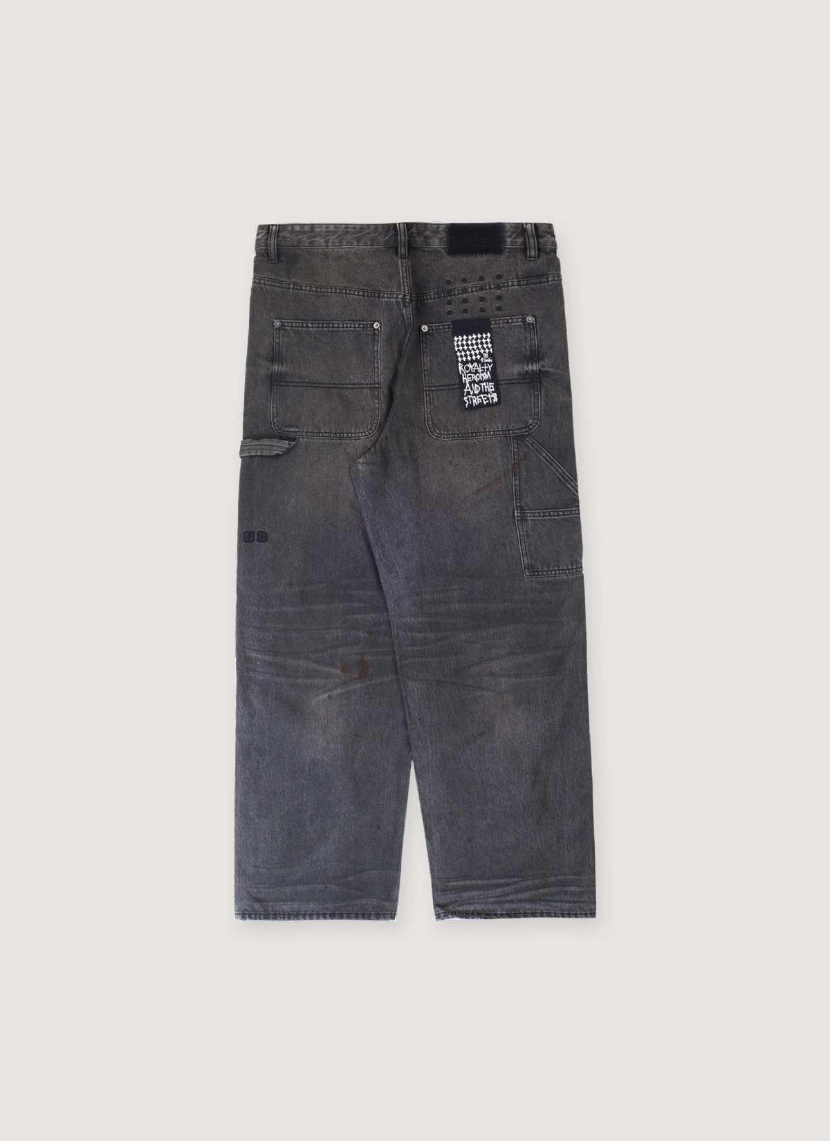 Ksubi Maxx Operator Mekanic Denim Pants Grey Jeans dirty vintage look with stains and branded black patch on back pocket, back view Ksubi Maxx Operator Mekanic Pants Grey - Image 2 | Authenticated at Pieces Los Angeles