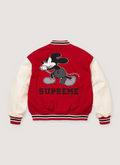 Supreme Number (N)ine Mickey Mouse Varsity Jacket Red with wool blend body, cowhide leather sleeves, fill and quilted satin lining, snap closure, double welt leather hand pockets, strip rib collar, cuff and hem, felt and chenille applique, embroidered Mickey Mouse and Supreme logos, pinback button, back view Supreme Number (N)ine Mickey Mouse Varsity Jacket Red - Image 2 | Authenticated at Pieces Los Angeles