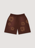 Denim Tears Mono Cotton Wreath Sweatshorts Brown with monochrome wreath flower graphics all over, front view