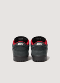 Nike Supreme Supreme SB 94 Dunk Low Black Red shoes with leather upper, rubber outsole with Zoom Air unit, padded mesh tongue, co-branded footbed with mesh collar and tongue lining, 3M reflective swoosh, metallic woven logo label on tongue, back view Nike Supreme SB 94 Dunk Low Black - Image 2 | Authenticated at Pieces Los Angeles