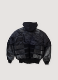 Pelle Pelle Opium K9 Bomber Jacket Black (Pre-Owned) Hoodie, leather sleeve and body piercing, filled nylon, satin lining with embroidered logo, interior pockets, Metal Opium and Double P badges, leather straps with adjustable velcro, custom Opium branded zipper pull, back view Pelle Pelle Opium K9 Bomber Jacket Black (Pre-Owned) - Image 2 | Authenticated at Pieces Los Angeles