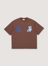 Off White 23 Varsity Skate Tee Chocolate Brown with VA and OW23 logo on front