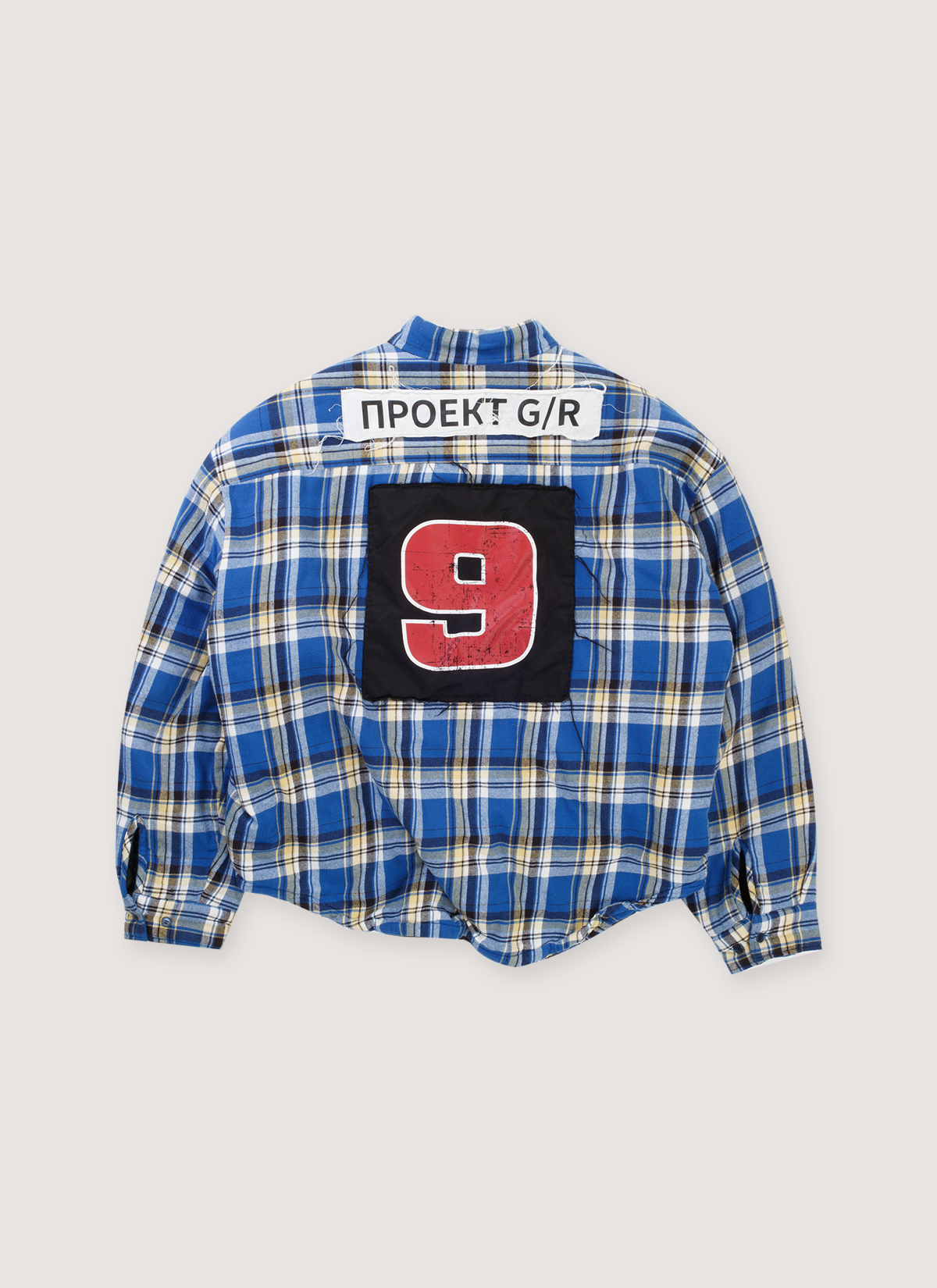 Project G/R Padded Check Jacket Blue (Pre-Owned) flanner outer with padded quilted inner, zip closure, printed and stitched patch of the number 9, embroidered Russian text, back view