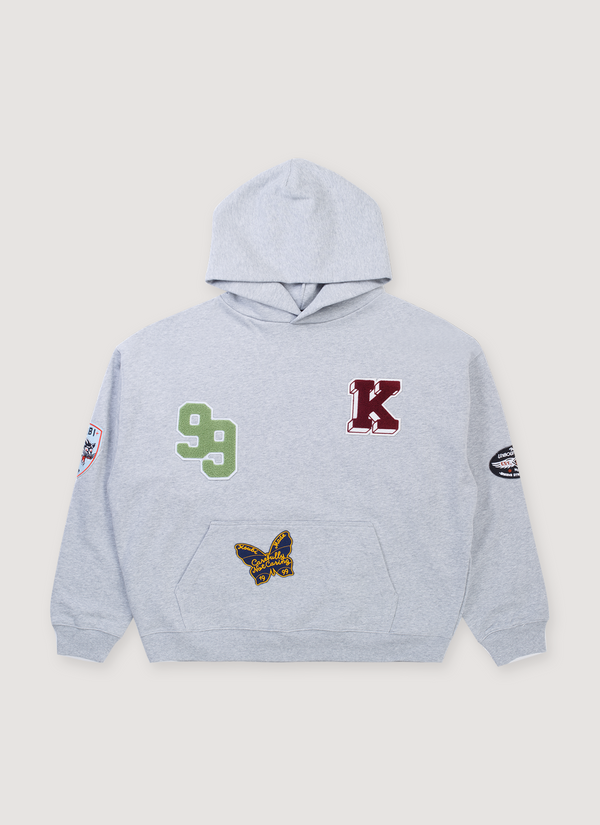 Ksubi Patched Ekcess Sweatshirt Grey Marle Hoodie with numbers, letters, and patch graphics all over, front view Patched Ekcess Sweatshirt Grey Marle - Authenticated Sweatshirts | Pieces Los Angeles