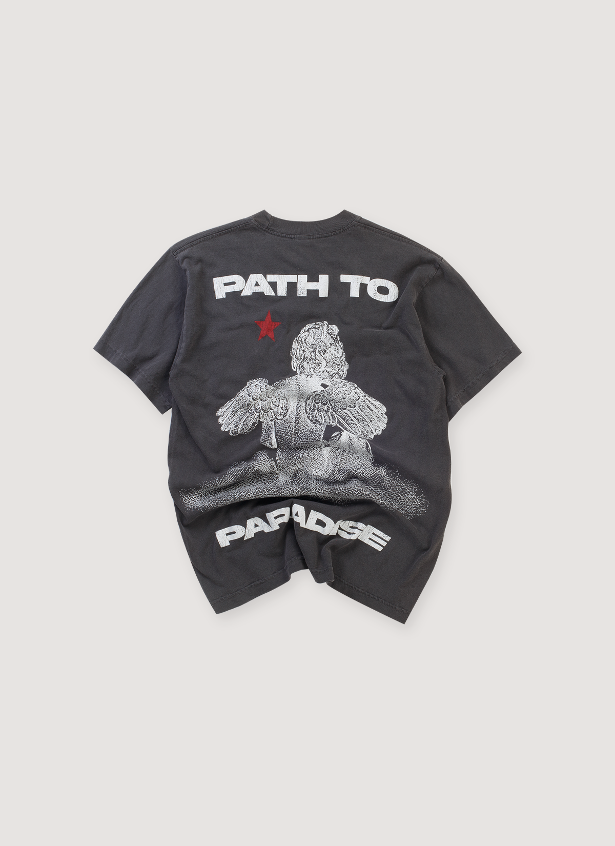 Hellstar Path to Paradise Tee Shirt Vintage Black (Pre-Owned) with distressed printed white graphic logo text and a graphic of an angel, back view Hellstar Path to Paradise Tee Vintage Black (Pre-Owned) - Image 2 | Authenticated at Pieces Los Angeles