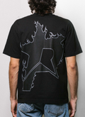 On-body shot of man wearing Pieces P Star Flame Tee shirt Tonal Black V2 back view Pieces P Star Flame Tee Tonal Black V2 - Image 4 | Authenticated at Pieces Los Angeles