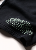 Pieces Repair Pleated Sweatpants Vintage Black with Japanese style repair stitch work, close up view of patchwork  Pieces Repair Pleated Sweatpants Vintage Black - Image 3 | Authenticated at Pieces Los Angeles